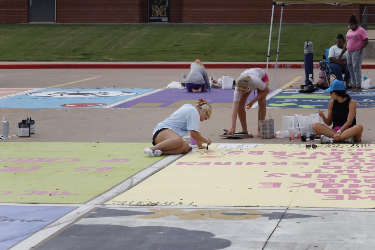 Seniors paint parking spot