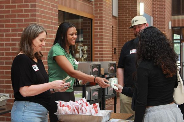 PTA members selling cookies during lunches